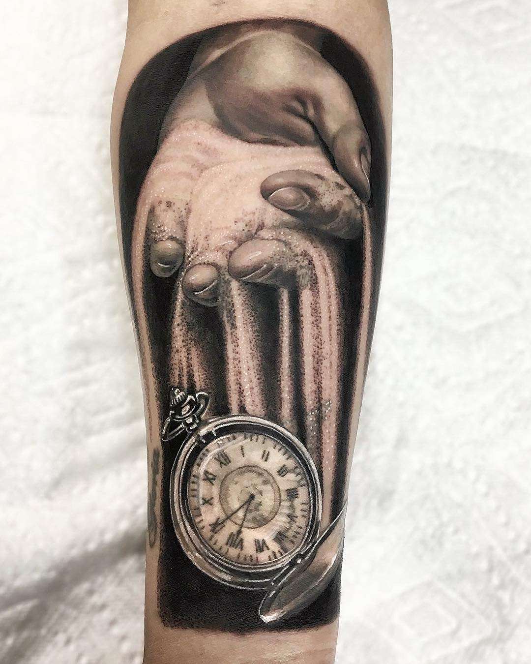 Realistic Pocket Watch Tattoo with a Hand above Pouring Sand | selftattoo.com