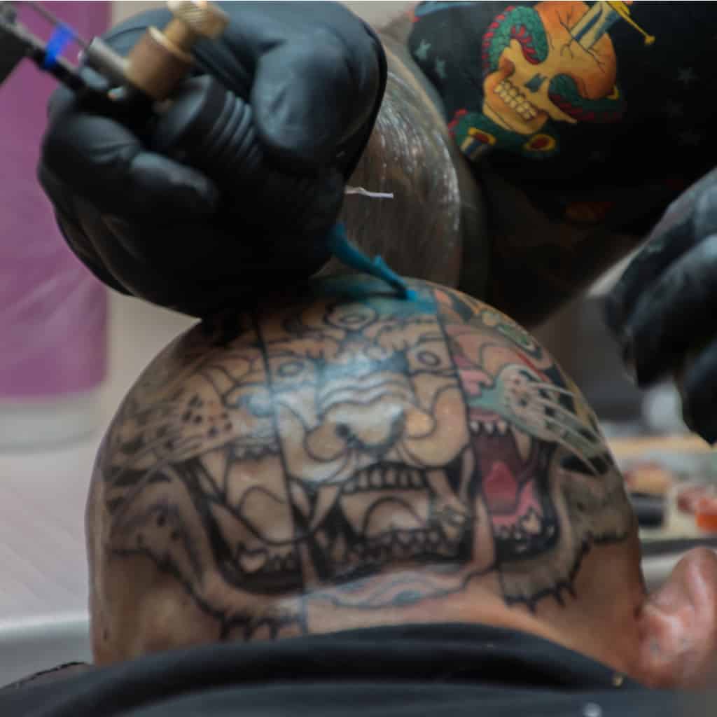 Fierce Neo Traditional Style Tiger's Face Split into Three Segments Head Tattoo | selftattoo.com