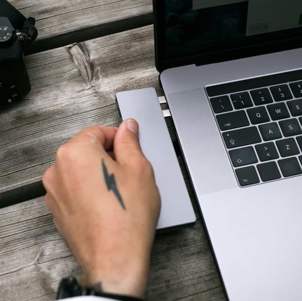 Bold Black Lightning Bolt Symbol Hand Tattoo | selftattoo.com