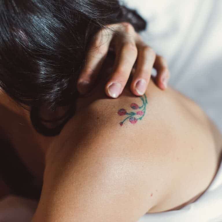 Small Minimalistic Poppy Flowers Shoulder Tattoo | selftattoo.com