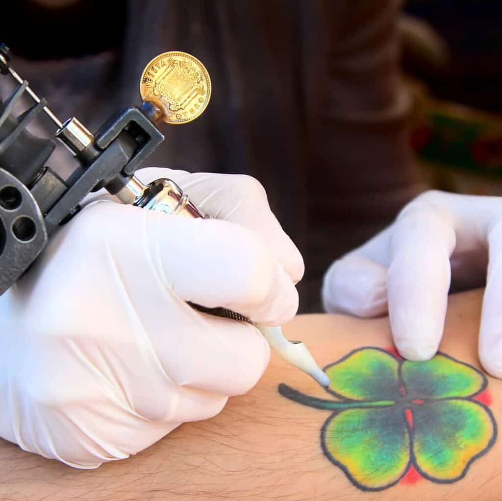 Vibrant Four-Leaf Clover Tattoo | selftattoo.com