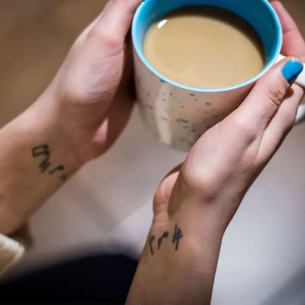 Small Simple Musical Notes Wrist Tattoo | selftattoo.com