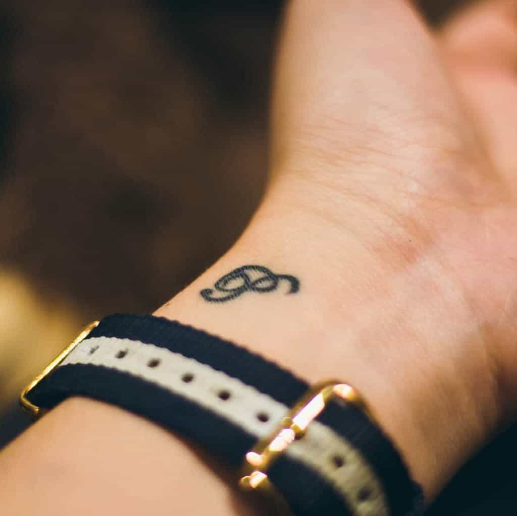 Small Elegant Letter "P" Wrist Tattoo | selftattoo.com