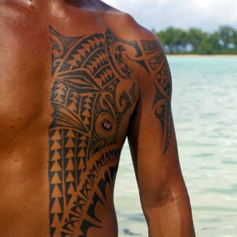 Bold Angular Polynesian Style Upper Body Tattoo | selftattoo.com