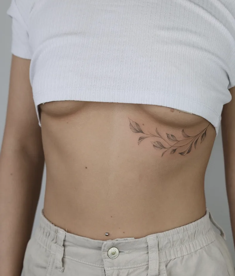 Leaves Under Chest Tattoo | selftattoo.com