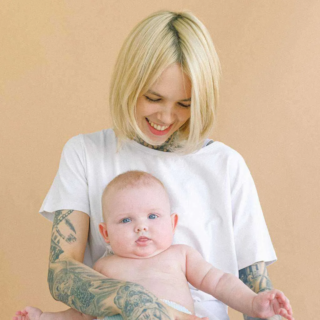 Tattooed Mother with Baby | selftattoo.com