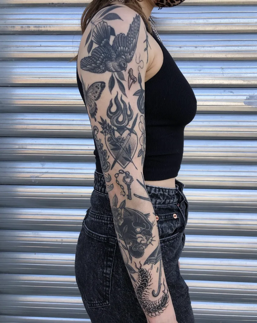 Blackwork Traditional Full Sleeve Patchwork Tattoo | selftattoo.com